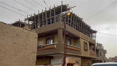 وقف أعمال تعلية مبنى سكنى بالعريش