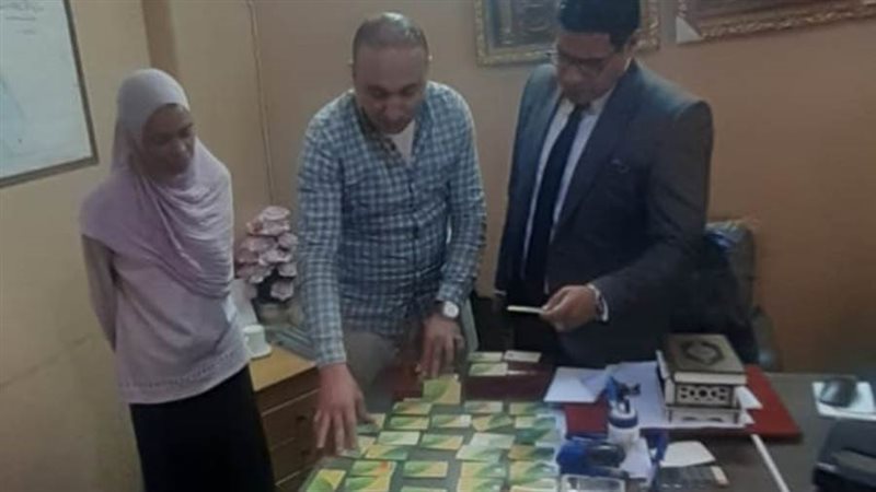 بطاقه تموينية بإحدى