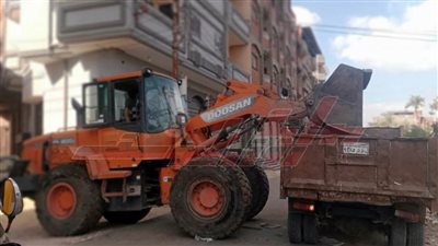 رفع تجمعات المخالفات من شوارع بيلا في كفر الشيخ