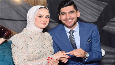 تهنئة لأجمل عروسين دكتور أحمد ودكتورة سارة 