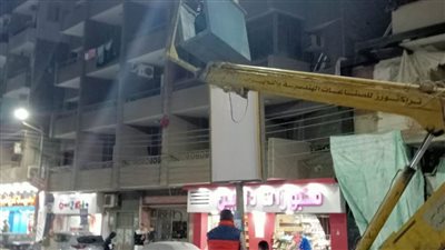استمرار حملات رفع كفاءة الإنارة العامة بالشوارع وصيانة الكشافات وتغطية الأعمدة بحي شرق أسيوط