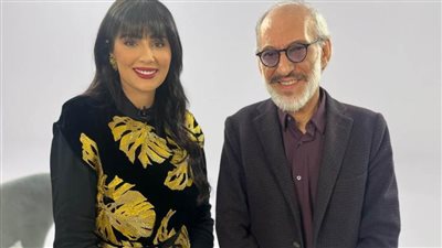 الفنان العالمي غسان مسعود يتأثر على كرسي الحياة مع ندى الشيباني