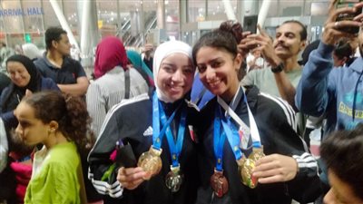 استقبال رسمي وشعبي لبعثة الكاراتيه التقليدي بمطار القاهرة بعد الفوز ببطولة العالم