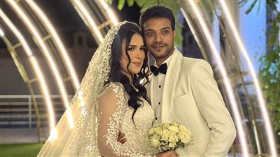 تهنئة للدكتورة ولاء والمهندس حازم طارق بمناسبة الزفاف السعيد