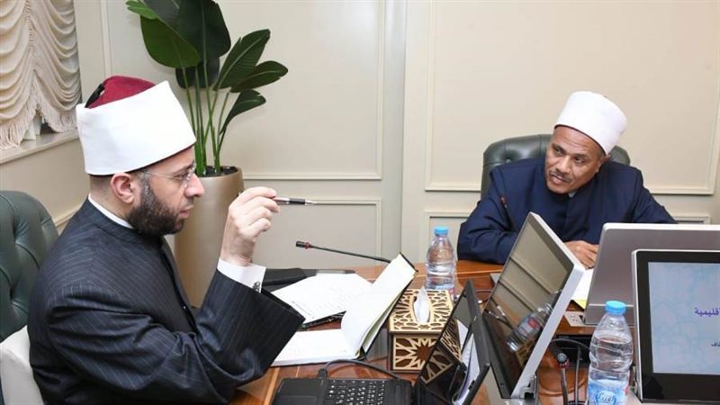 وزير الاوقاف ومدير