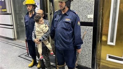 أمن الفيوم يستجيب لشخص ونجله محتجزين داخل مصعد عقار 