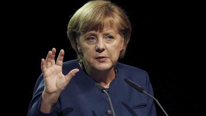 ميركل تطالب بالتفاوض