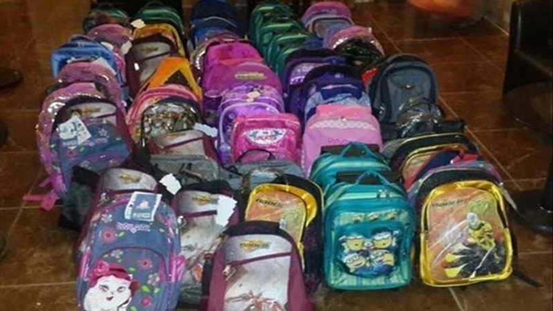 توزيع 450 حقيبة مدرسية