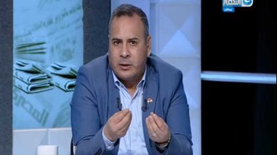 القرموطي يرتدي النقاب على الهواء (فيديو)