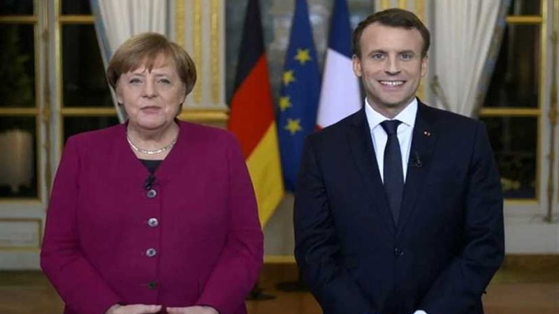 ماكرون وميركل يبحثان