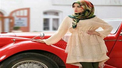 مصممة الأزياء 