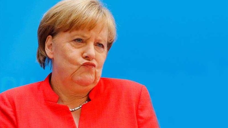 أول تعليق من ميركل