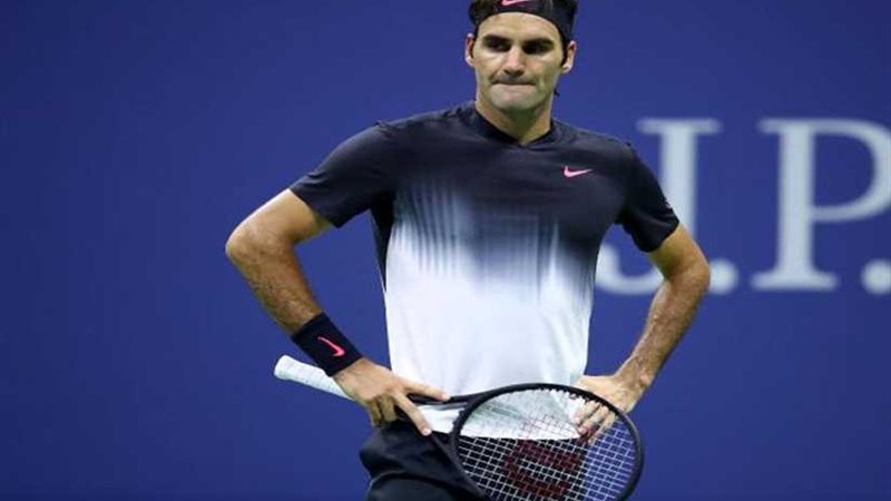 فيدرير يودع ويمبلدون