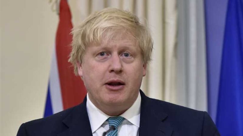 جونسون يطالب ماي