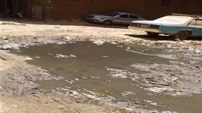 بالصور أهالي المنيب يشتكون من الصرف الصحي والقمامة