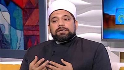 حكم الاستغناء عن الوضوء بالاستحمام 