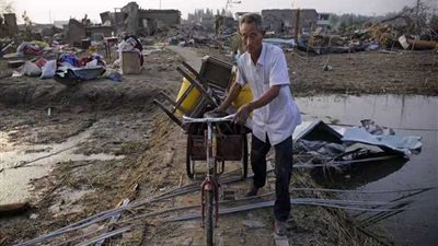 الصين تجلي 200 ألف وإعصار يضرب ساحلها الشرقي