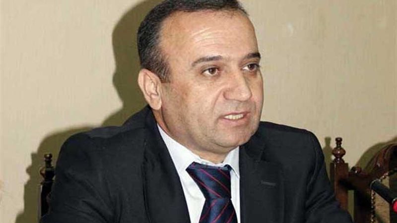 وزير سوري يدعو اللاجئين