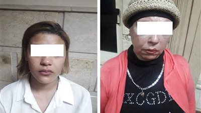 ضبط موظفة تقود شبكة 