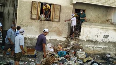 شقة تحولت إلى مقلب قمامة بحي الضواحي