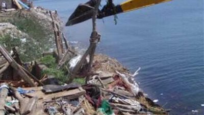 إزالة 11 حالة تعد على جسر النيل بشربين