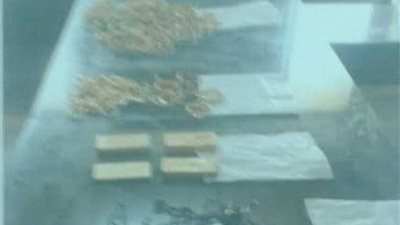 ضبط سبائك ومشغولات ذهبية مدموغة بأختام مقلدة بالقاهرة