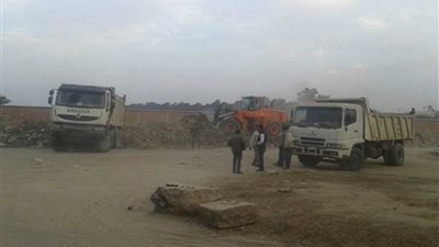 الخانكة تتجمل برفع القمامة ودهان الطرق