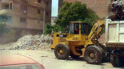 منظومة الشكاوى تزيل أكوام القمامة بالوراق والمرج