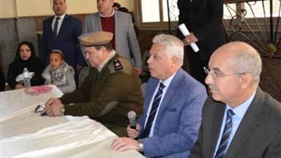 مدير أمن البحيرة يكرم أسر الشهداء.. (صور)