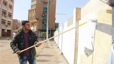 رسومات جرافيتي تزين طب المنوفية في يوم من أجل الجامعة