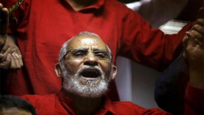 بديع والعريان يرفضان الخروج من قفص الاتهام وتاجيل فض رابعة لجلسة 31مايو