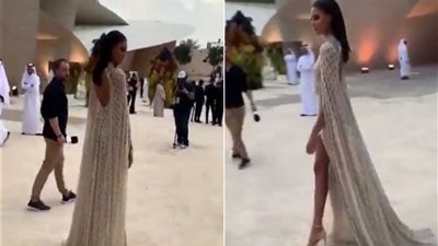 ملابس عارضة أزياء تفضح تناقض نظام الحمدين