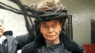 بالصور.. صيني لم يقص شعره لأكثر من 50سنة (صور)