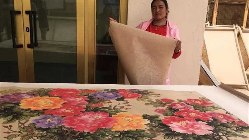 أهالي شينجيانج  يستعيدون