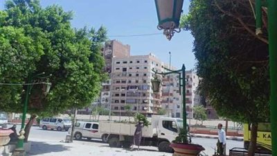 حملات لإزالة الإشغالات ودهان البلدورات والميادين بأسيوط