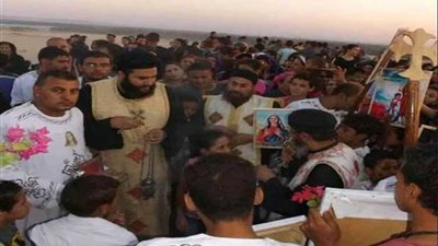 أقباط المنيا يحييون عيد الشهداء بأنصنا