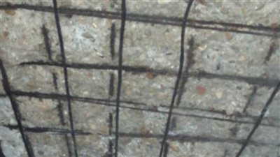 انهيار أجزاء من عقار بالمنصورة بسبب سوء الطقس 