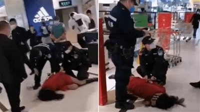   القبض على امرأة رفضت إرتداء كمامة تحميها من 