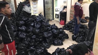 توزيع مواد غذائية على 2200 أسرة من العمالة غير المنتظمة بالمرج