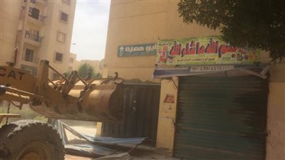 حملة لإزالة التعديات ورفع الإشغالات بحدائق أكتوبر (صور)