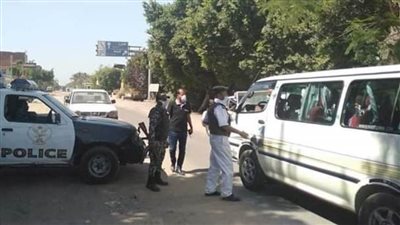 حملات على مواقف وأسواق الجيزة للتأكد من الالتزام بارتداء الكمامات