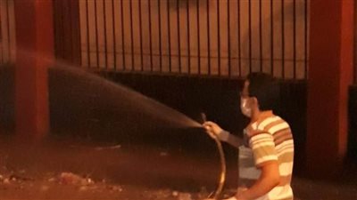 تطهير وتعقيم وسائل النقل ومحيط مستشفى العزل بملوي بالمنيا