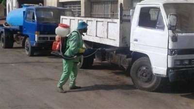 توزيع كمامات وقفازات لعمال النظافة بالبحيرة 