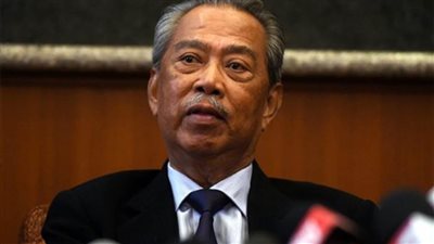 ماليزيا تبحث جعل ارتداء الكمامات بالأماكن العامة إلزاميا 