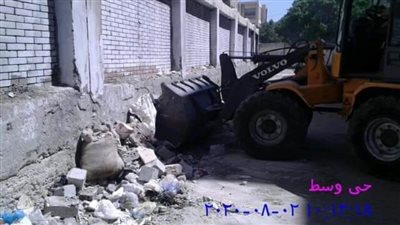 حملة لرفع ٢٠ طن مخلفات متنوعة من شارع بلقيس بالإسكندرية
