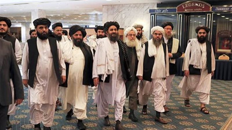 وفد طالبان أثناء