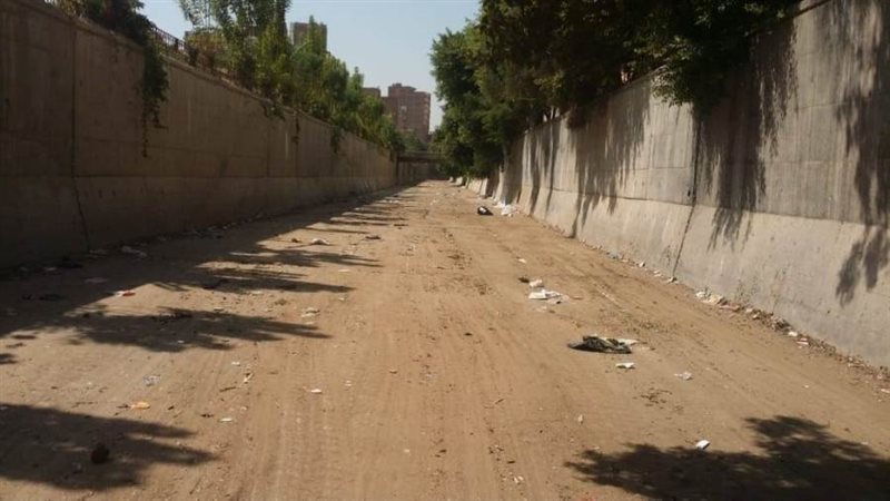 تطهير مجري السيل