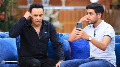 مصطفى قمر وشقيقه ياسر وابنه تيام في 