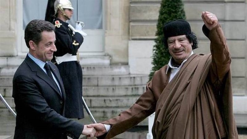 معمر القذافي والرئيس