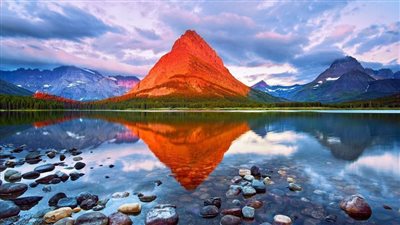 نار وجليد.. جبل جرينيل البرتقالي طبيعة ساحرة (صور)